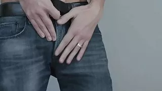 Young man jerking his massive cock off hard