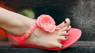 Feet 043 - Black Pedicured Toes Exposed Wearing Pink Sandals