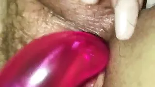 Playing with her hairy wet pussy