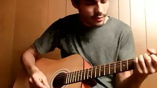 Handsome young man enjoys his guitar and jerkoff solo