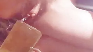 Big Clitoris Pissing In Glass