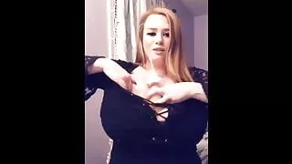 Yungfreckz sticks things between her huge melons