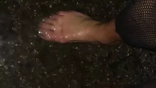Feet & Clear Shoes in the Water