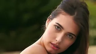 Sensual teen Katrine Pirs shows off shaved pussy outdoors