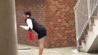Japanese babe peeing herself up and being filmed by voyeur