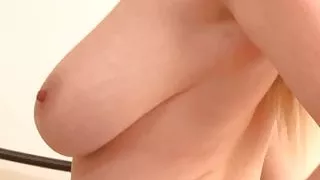 blonde give a striptease