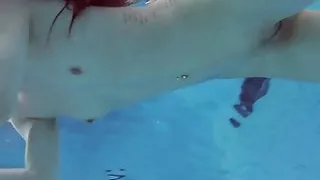 Roxalana Cheh sexy redhead underwater