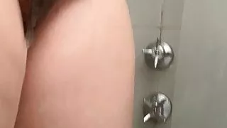 unshaved wife is showering