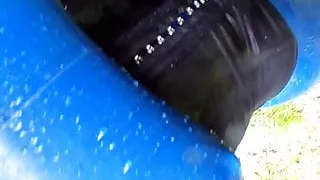 blue latex catsuit in my garden