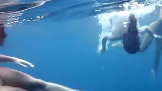 Hot erotics in the sea with 3 girls