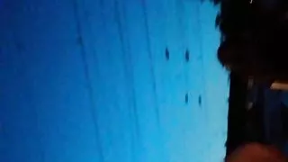 Jerking behind girl at train station with cumshot