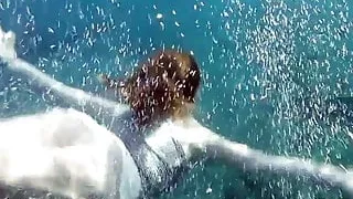 Swimming gracefully naked underwater