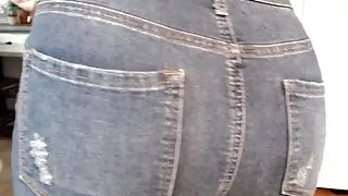 Cute curly haired blonde farting in jeans