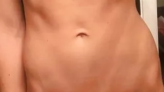 Skinny fit naked girl showing her pussy close-up