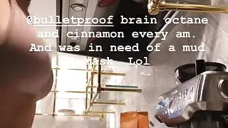 Nikki Bella making breakfast while wearing a mud mask
