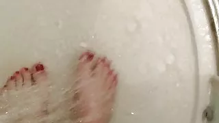Red high heels and shower