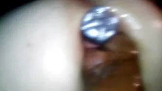 Bottle in the ass fist in the pussy