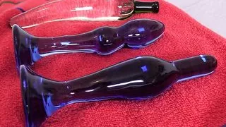 Fucking her peehole with big toys and dick