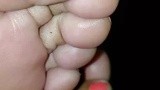 Wife relaxing feet on me