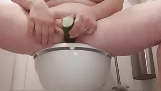 Stupid slut fucks cucumber and eats it