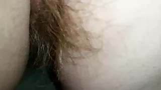 Playing with her hairy ass