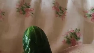 Mature Fucks her pussy with cucumber