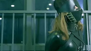 Catsuit girl gagging tick