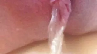 Evelle extreme close-up pissing and spreading
