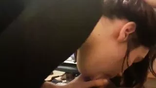 Beautiful young brunette gives head to her boyfriend