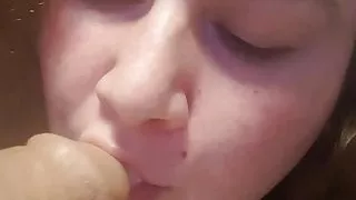 woman sucking dildo