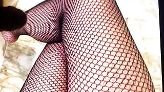 Crossed nylon legs cum tribute