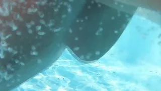 mature underwater in swimming pool
