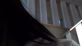 Japanese chick wakes up and pees in a jar while on the floor