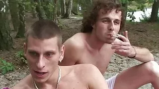 Old blonde woman takes double penetration outdoors