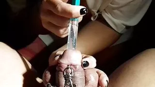 girlfriend plays with sissy's chained peehole