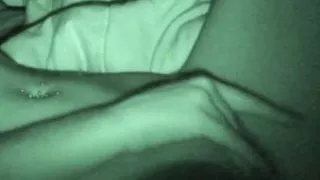 Nightcam captures a beauty masturbating passionately