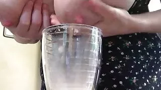 Milking her tits