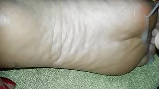 My wife relaxing and cum feet 7