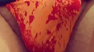 Playing with my bulge in a fire thong