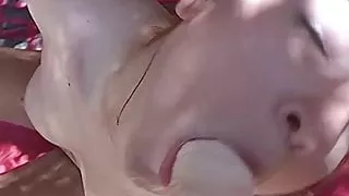 Teengirl Kikki gives a blowjob on the beach