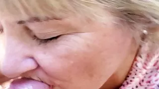 old lady sucks cock behind office