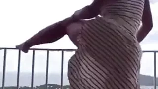 Topless twerk on the balcony