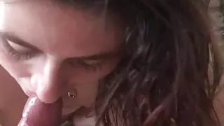 Brunette with cute tits sucking big cock