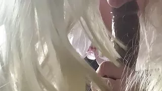 Young Crossdresser sucks black dildo
