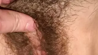 Fingering hairy pussy