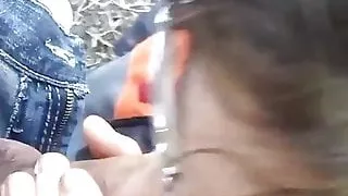 Ugly nerdy whore sucking cock in woods