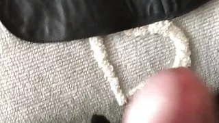 Milking in leather coat gloves and boots