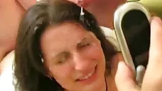 Talks on phone to her ex while getting bukkake