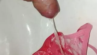 A piss after the wank in the pink panties