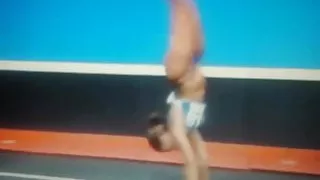 RedBone Ebony doing backflips in string blue thongs